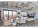 Inviting common area featuring comfortable seating, tables, and recreation space for residents at 4260 Placida Rd # 8D, Englewood, FL 34224