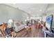 Open-concept living space connecting the living room, dining area, and kitchen for seamless entertaining at 4260 Placida Rd # 8D, Englewood, FL 34224