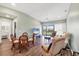 Cozy living area flowing into the dining area, complete with a screened patio and plenty of natural light at 4260 Placida Rd # 8D, Englewood, FL 34224