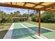 The community offers shuffleboard courts with covered shelter, perfect for friendly competition and outdoor fun at 4260 Placida Rd # 8D, Englewood, FL 34224