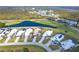 Beautiful aerial shot of the house, showcasing the location and golf course view at 6 Windward Ct, Placida, FL 33946