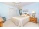 Bright bedroom with closet, plush bedding, and soft, natural lighting at 6 Windward Ct, Placida, FL 33946