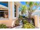Charming single Gathering home with mature landscaping and a white trimmed windows at 6 Windward Ct, Placida, FL 33946