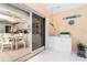 Covered lanai featuring a sink, counter space, and view into the kitchen and breakfast nook at 6 Windward Ct, Placida, FL 33946