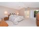 Comfortable bedroom with ample natural light and ensuite bathroom at 6 Windward Ct, Placida, FL 33946