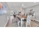 Inviting dining area features gray walls and offers a view into the eat-in kitchen at 6000 Boca Grande Cswy # D38, Boca Grande, FL 33921