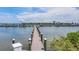 Picturesque dock with boats, serene water views, and inviting atmosphere for nautical enthusiasts at 6000 Boca Grande Cswy # D38, Boca Grande, FL 33921