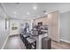 Gourmet kitchen with granite countertops, stainless appliances, and a breakfast bar for casual dining at 6000 Boca Grande Cswy # D38, Boca Grande, FL 33921