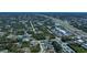An aerial view of a charming home nestled in a quiet neighborhood near a major highway and commercial area at 6368 Pennell St, Englewood, FL 34224