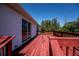Exterior view of a backyard deck and sliding glass doors at 6368 Pennell St, Englewood, FL 34224
