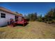 Backyard deck with a view of the green grass at 6368 Pennell St, Englewood, FL 34224