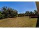 The backyard and wooden deck offer outdoor enjoyment at 6368 Pennell St, Englewood, FL 34224