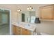 Bathroom with double sinks at 6368 Pennell St, Englewood, FL 34224