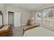 Bedroom showcasing natural light, a comfortable bed, and a view to the outdoors at 6368 Pennell St, Englewood, FL 34224
