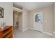 Bright foyer featuring tile flooring and a glass-paneled front door and entrance ways at 6368 Pennell St, Englewood, FL 34224