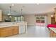 The kitchen and dining area feature modern appliances and an open floor plan concept at 6368 Pennell St, Englewood, FL 34224