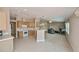 Wide shot of the open-concept home, seamlessly connecting kitchen and living areas for easy living at 6368 Pennell St, Englewood, FL 34224