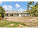The backyard has ample space for recreation or gardening at 730 Buckskin Ct, Englewood, FL 34223