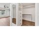 Walk-in closet with built-in shelving and drawers in Primary bedroom at 730 Buckskin Ct, Englewood, FL 34223