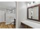 Bathroom vanity and walk in shower with marble tile at 746 Brentwood Dr, Venice, FL 34292