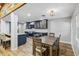 Open concept kitchen and dining area showcases modern cabinetry and sleek stainless steel appliances at 746 Brentwood Dr, Venice, FL 34292