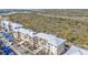 Beautiful aerial view of the condo complex surrounded by nature at 8409 Placida Rd # 305, Placida, FL 33946