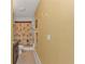 Bright bathroom with a granite vanity, neutral tiling, and a shower with a palm tree curtain at 8409 Placida Rd # 305, Placida, FL 33946