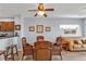 Dining room with seating for six offers views of the kitchen and living room at 8409 Placida Rd # 305, Placida, FL 33946