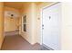 Building entrance featuring unit number 305 and convenient access to amenities at 8409 Placida Rd # 305, Placida, FL 33946