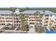 Resort-style building with palm trees and easy parking at 8409 Placida Rd # 305, Placida, FL 33946