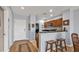 Kitchen with breakfast bar is conveniently located near the home's entrance at 8409 Placida Rd # 305, Placida, FL 33946