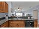 Open concept kitchen showcases an extended breakfast bar at 8409 Placida Rd # 305, Placida, FL 33946