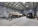 Spacious garage equipped to house a boat, jeep, and bikes at 9260 Saint Catherine Ave, Englewood, FL 34224