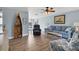Comfortable living room featuring hardwood floors and bright decor at 9382 Rosebud Cir, Port Charlotte, FL 33981