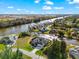 Aerial view of waterfront home on a corner lot with a boat dock and beautiful canal views at 10491 Sarasota Rd, Port Charlotte, FL 33981