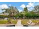 Lush back yard overlooking canal, including landscaped lawn and boat dock at 1173 Brown St, Englewood, FL 34224
