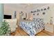 Inviting bedroom featuring a queen-sized bed, soft lighting, and stylish decor at 1173 Brown St, Englewood, FL 34224