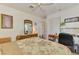 Bright bedroom with a dresser, closet, and a workspace setup at 1173 Brown St, Englewood, FL 34224