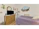 Cozy bedroom features a twin bed, dresser, and decorative accents at 1173 Brown St, Englewood, FL 34224