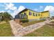 Exterior view of the home and the back deck overlooking the canal at 1173 Brown St, Englewood, FL 34224