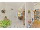 Bright foyer with white marble floors, leading to the dining area, creating a welcoming entrance at 1173 Brown St, Englewood, FL 34224