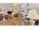 Spacious living room with wood floors and neutral decor, offering a relaxing space for Gathering and friends at 1173 Brown St, Englewood, FL 34224