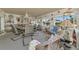 Relaxing sunroom with cozy seating and nautical decor, lots of light at 1173 Brown St, Englewood, FL 34224