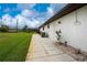 Home exterior showcasing a shuffleboard court for outdoor recreation at 12 Charleston Cir, Englewood, FL 34223