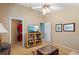 Comfortable bedroom with ceiling fan and closet access at 12432 Nova Ave, Port Charlotte, FL 33981