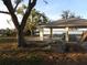 Community park featuring a picnic pavilion and tables, ideal for outdoor gatherings and waterfront enjoyment at 12432 Nova Ave, Port Charlotte, FL 33981