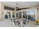 Covered patio with dining area, providing serene outdoor living space at 12432 Nova Ave, Port Charlotte, FL 33981