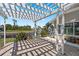 The cozy outdoor patio and beautiful landscaping provides the perfect space for relaxation and entertainment at 12432 Nova Ave, Port Charlotte, FL 33981