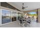 Screened patio features a dining area with waterfront views at 12432 Nova Ave, Port Charlotte, FL 33981