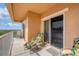 Unwind on this charming balcony with comfy chairs and enjoy beautiful views from this residential location at 1420 Beach Rd # 203, Englewood, FL 34223